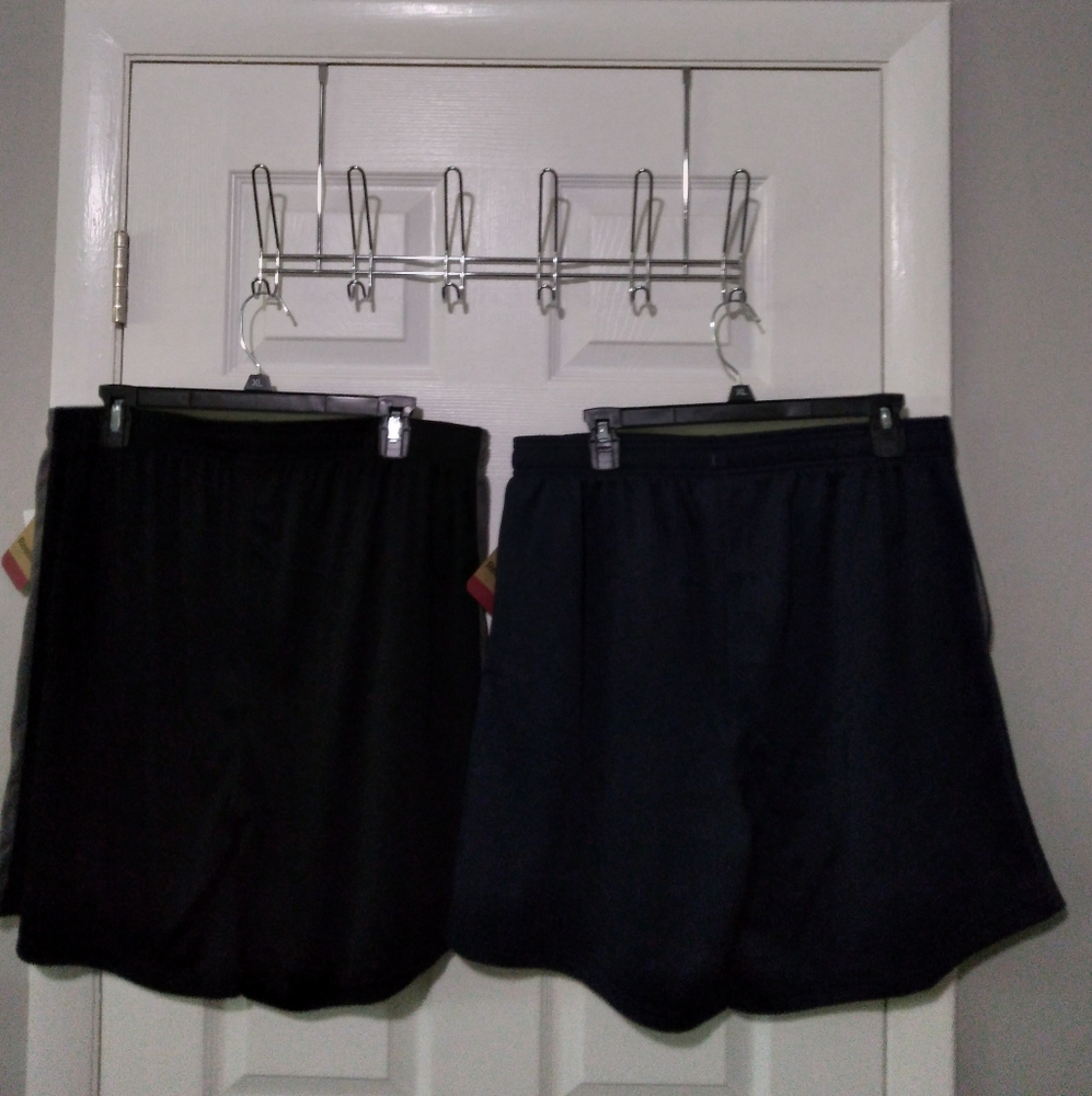 2 Men's Reebox Shorts XL, 1 Black and 1 Blue w/ gray stripe.